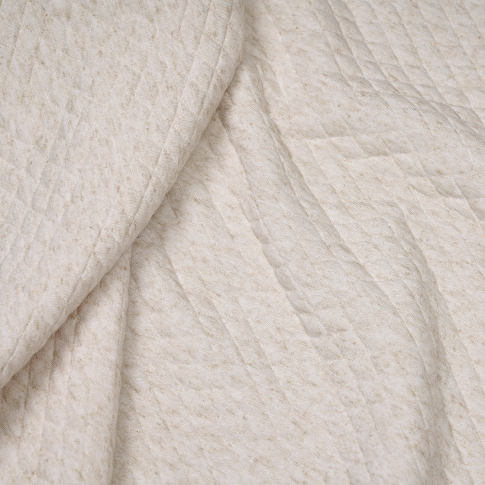 Tissu matelassé crème à motif losange moucheté beige - pretty mercerie - mercerie en ligne