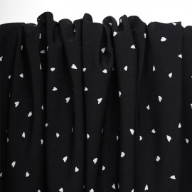 Tissu crêpe noir à motif petit coeur blanc | Pretty Mercerie | mercerie en ligne