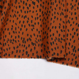 Tissu coton burnt orange à motif pois irrégulier et délavé noir| Pretty Mercerie | Mercerie en ligne