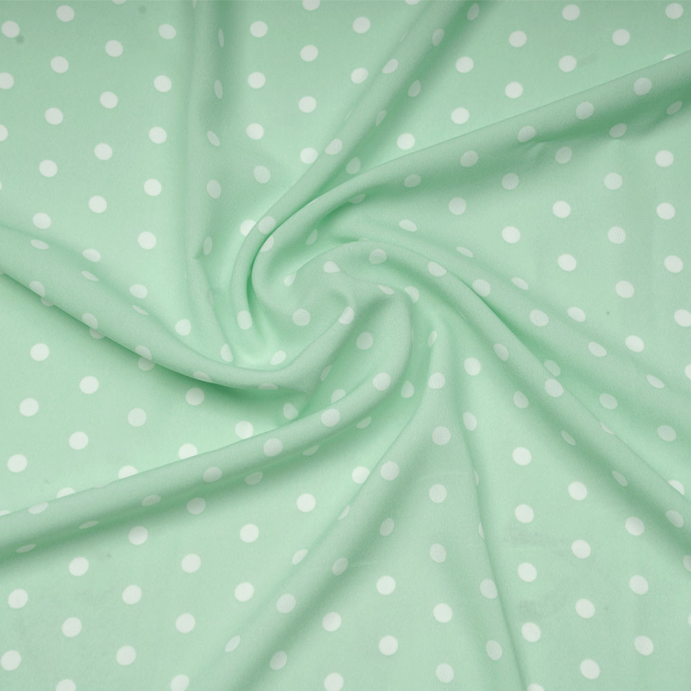 Tissu crêpe vert pastel à motif pois blanc | Pretty Mercerie | Mercerie en ligne