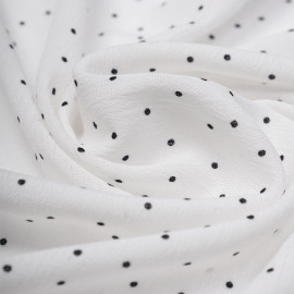 Tissu viscose blanc à motif petit pois noir | Pretty Mercerie | mercerie en ligne