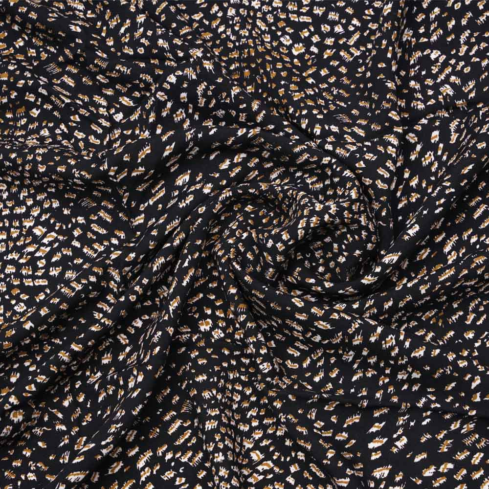 Tissu viscose noir à motif léopard miel doré et crème | Pretty mercerie | mercerie en ligne