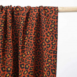 Tissu viscose orange rust à motif léopard noir et caramel |Pretty Mercerie | mercerie en ligne