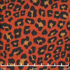 Tissu viscose orange rust à motif léopard noir et caramel |Pretty Mercerie | mercerie en ligne