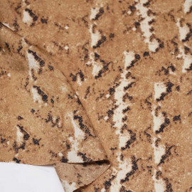Tissu satiné marron à motif serpent noir et beige | Pretty Mercerie | mercerie en ligne