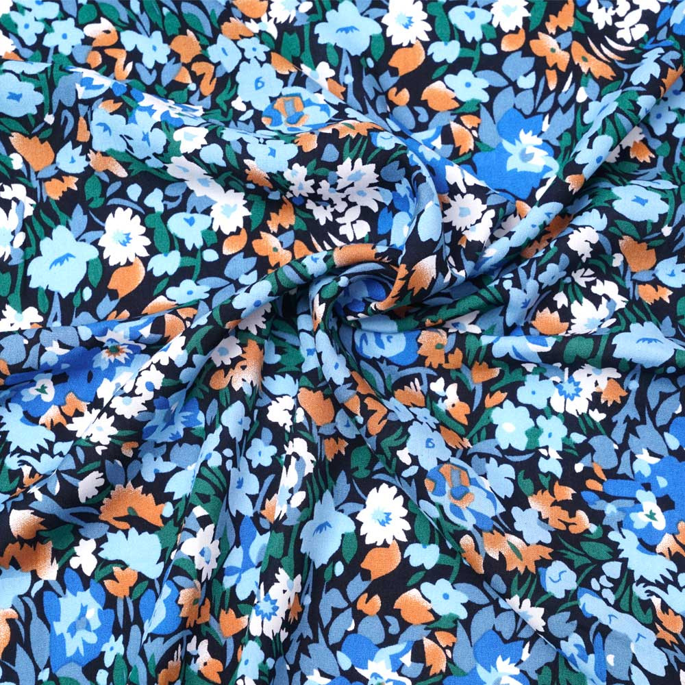 Tissu viscose bleu marine à motif floral abstrait abricot et bleu | pretty mercerie | mercerie en ligne