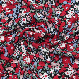 Tissu viscose noir à motif floral abstrait rouge et bleu | pretty mercerie | mercerie en ligne
