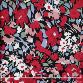 Tissu viscose noir à motif floral abstrait rouge et bleu | pretty mercerie | mercerie en ligne