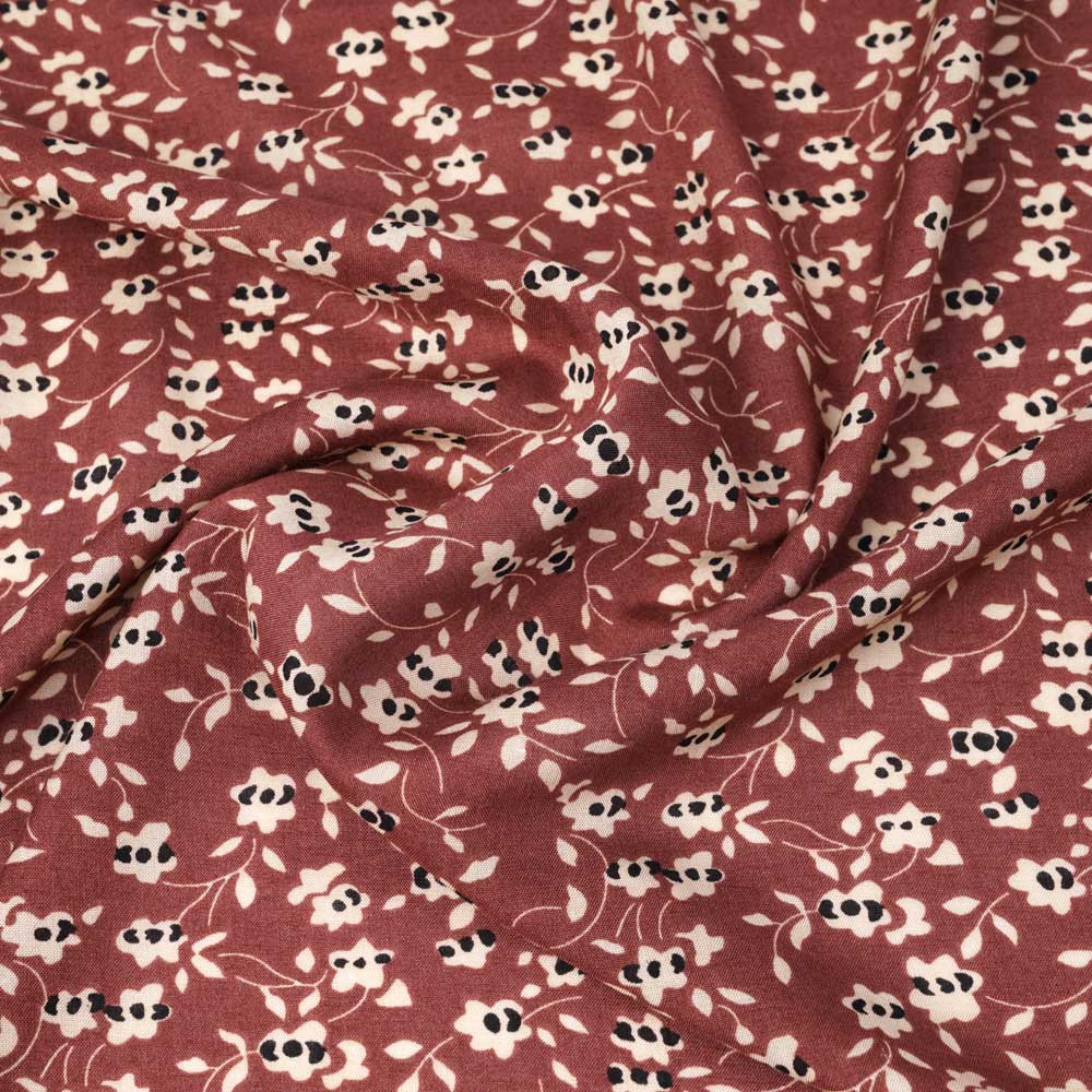 Tissu viscose tandoori spice à motif floral beige et noir | Pretty Mercerie | Mercerie en ligne